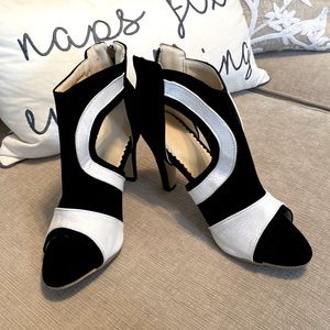 Black and white heeled sandals